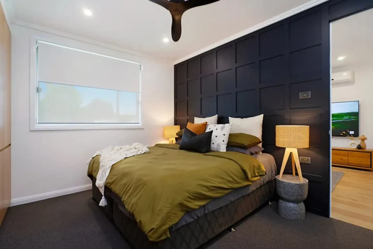 Main bedroom with panelled feature wall